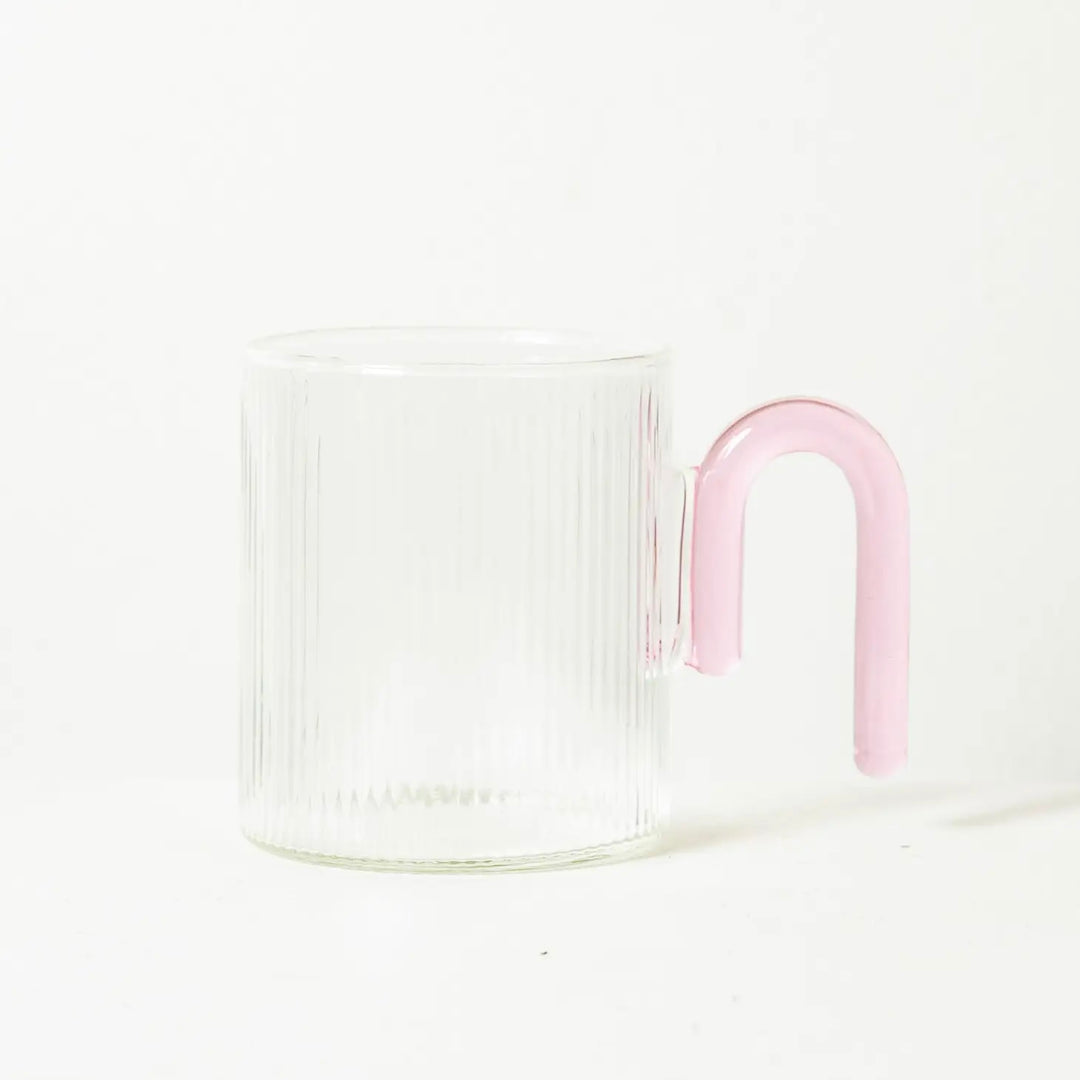 clear fluted glass mug with pink arch handle