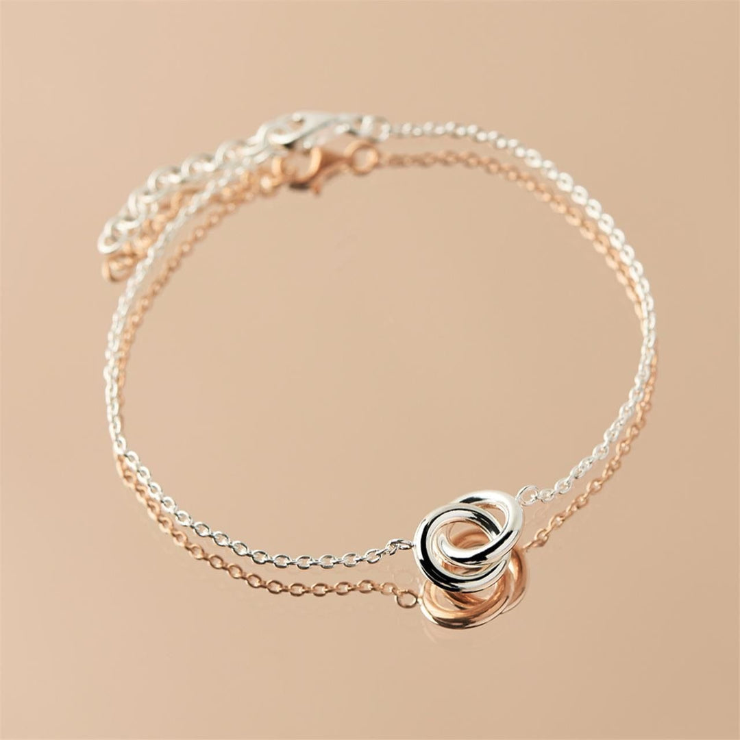 Embrace Bracelet Silver With Interlocking Loop Detail