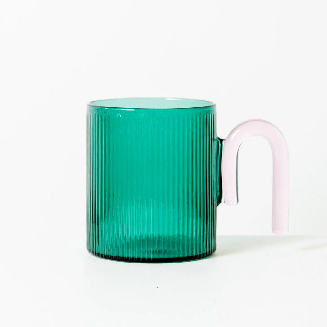 Green fluted glass mug with pink arch handle